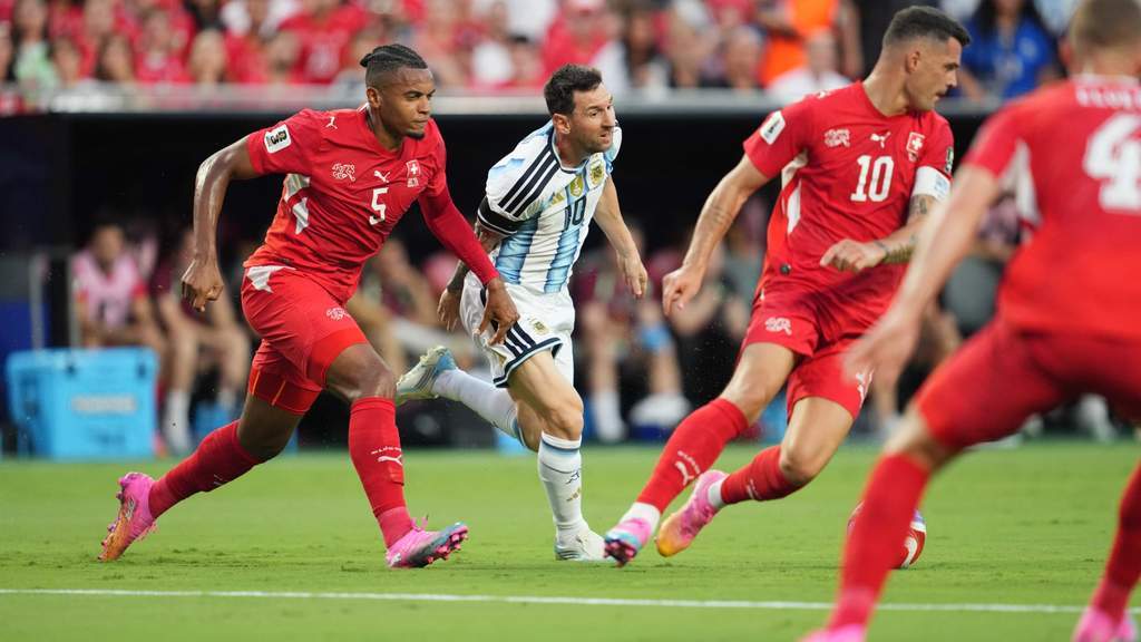 Argentina national football team players celebrating victory against Switzerland in World Cup 2026