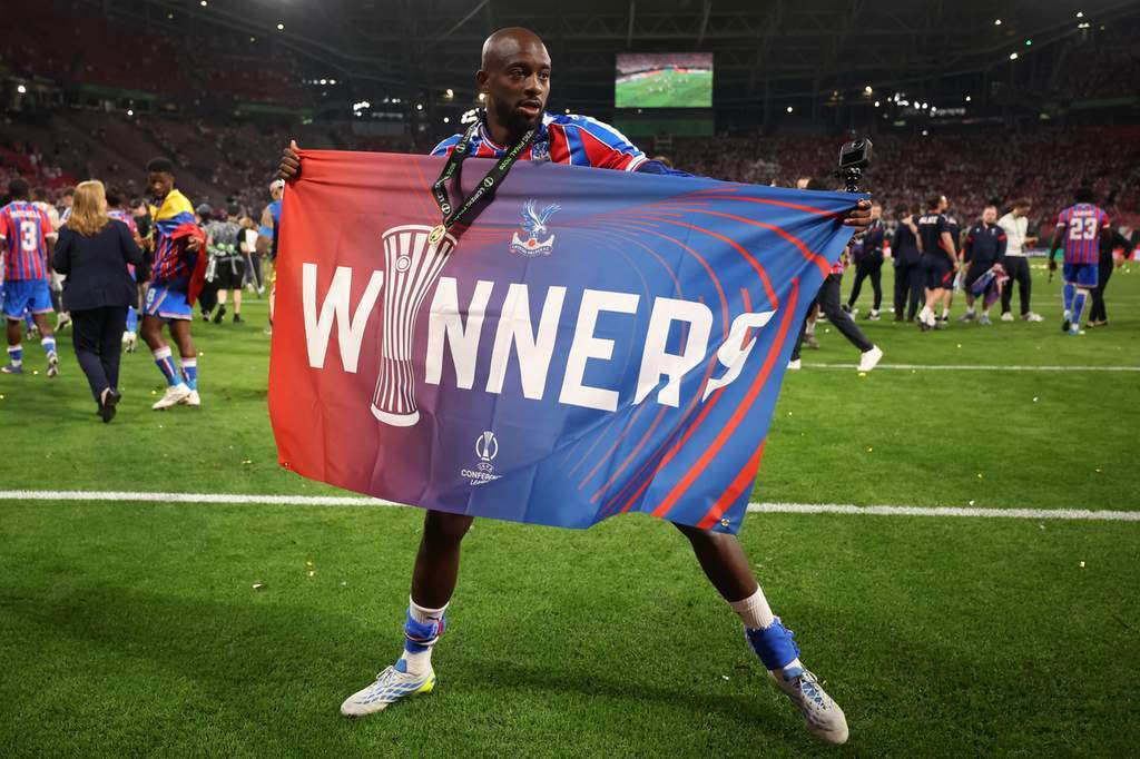 Jean-Philippe Mateta celebrating victory with Crystal Palace in a European final