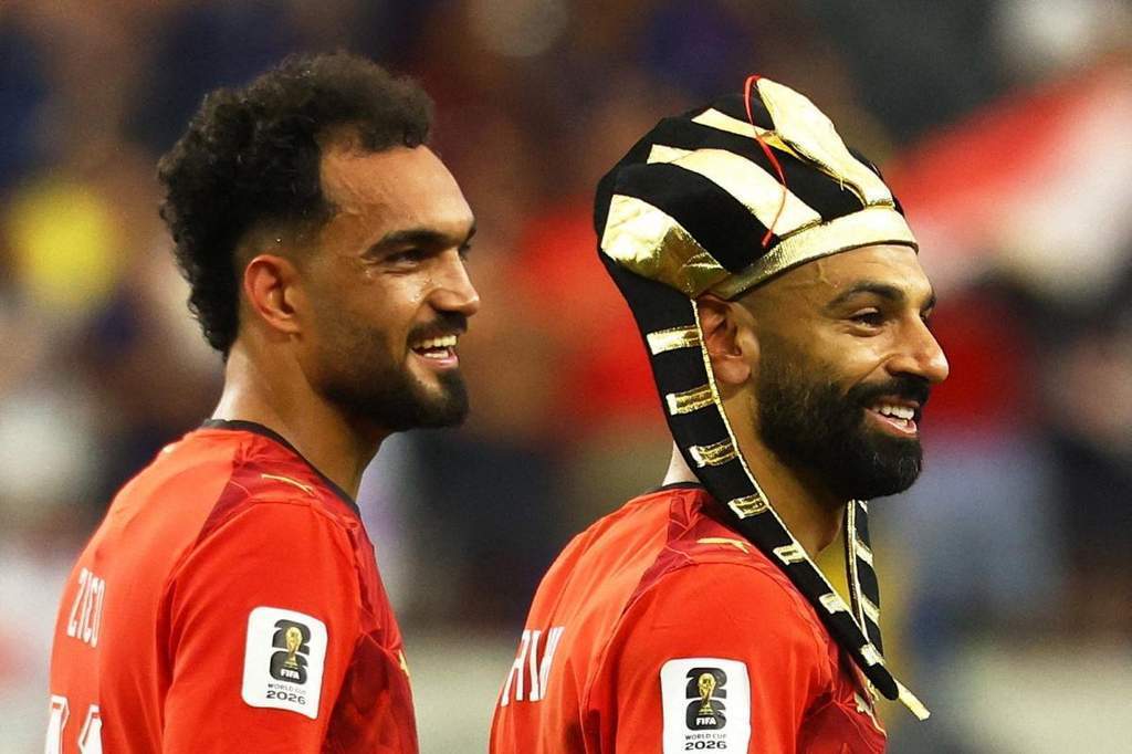 Mohamed Salah celebrates after scoring a crucial Panenka penalty for Egypt at the World Cup.