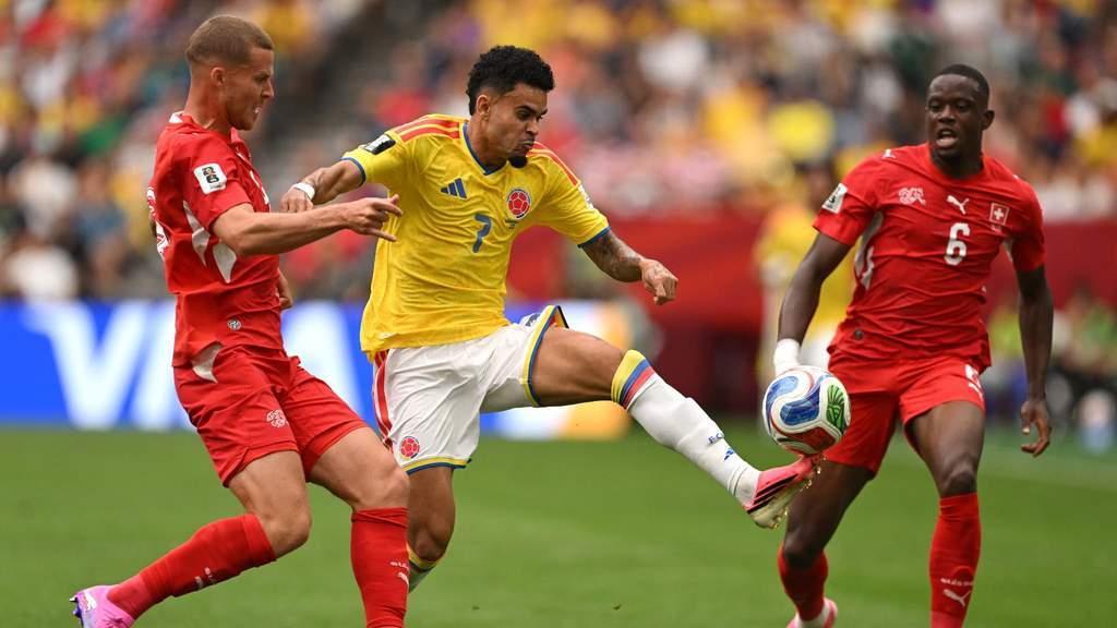 Switzerland players celebrate after defeating Colombia in a penalty shootout at the 2026 World Cup
